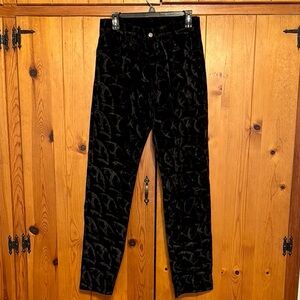 1990s black velvet jeans feature a cool textured pattern